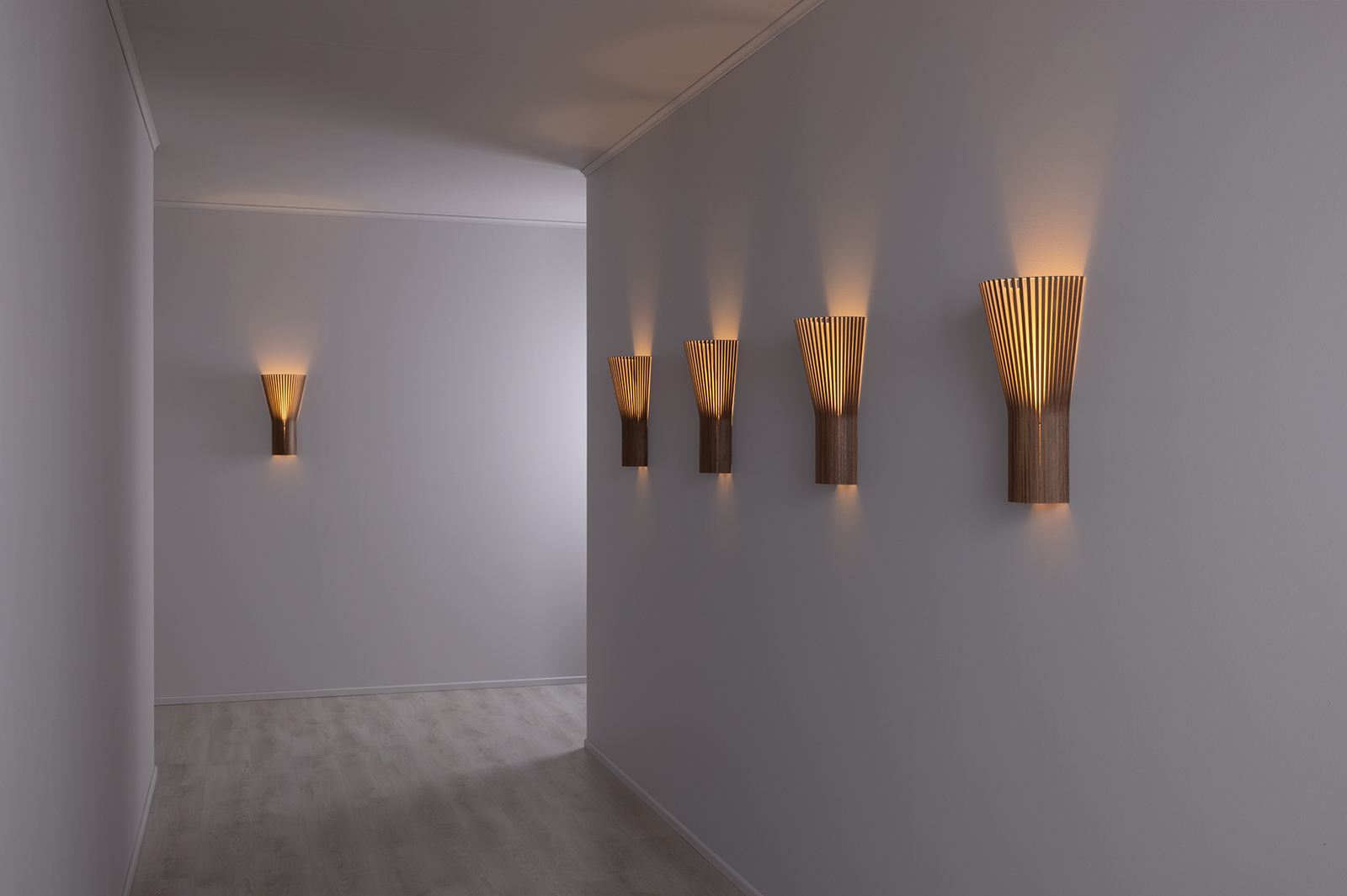 Wall lamps in a corridor.
