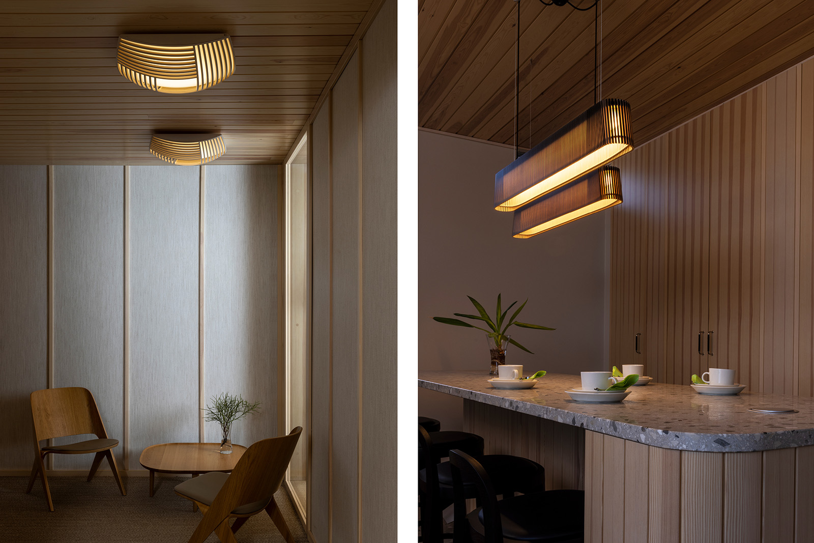 Ceiling lamps above a seating area. Elongated pendant lamps above a kitchen island.